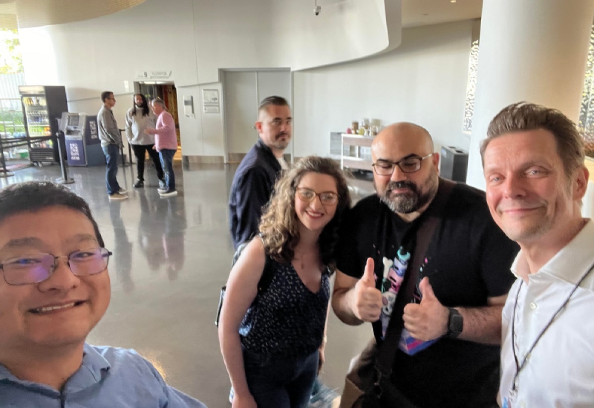 The GamesBeat crew gets a selfie with Sam Lake.  Thomas Puha is the photo bomber.